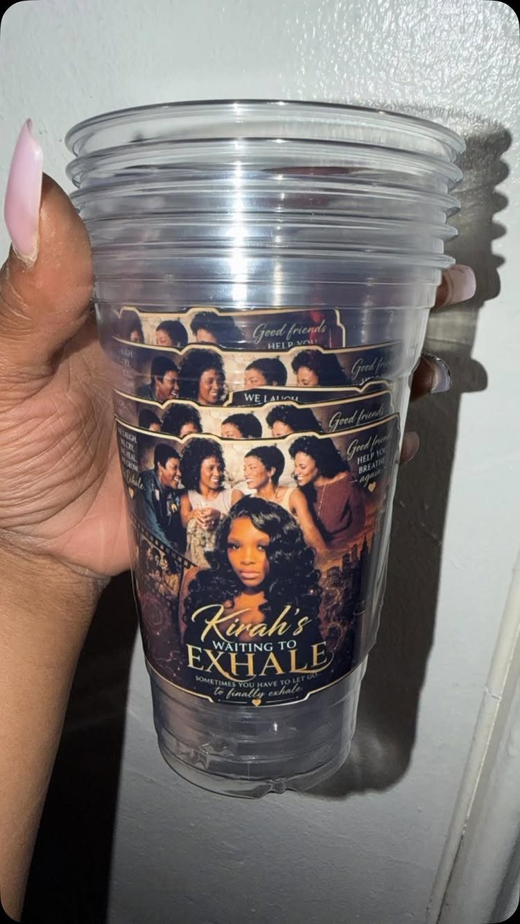 Stack of clear plastic cups with a personalized photo wrap and gold text.