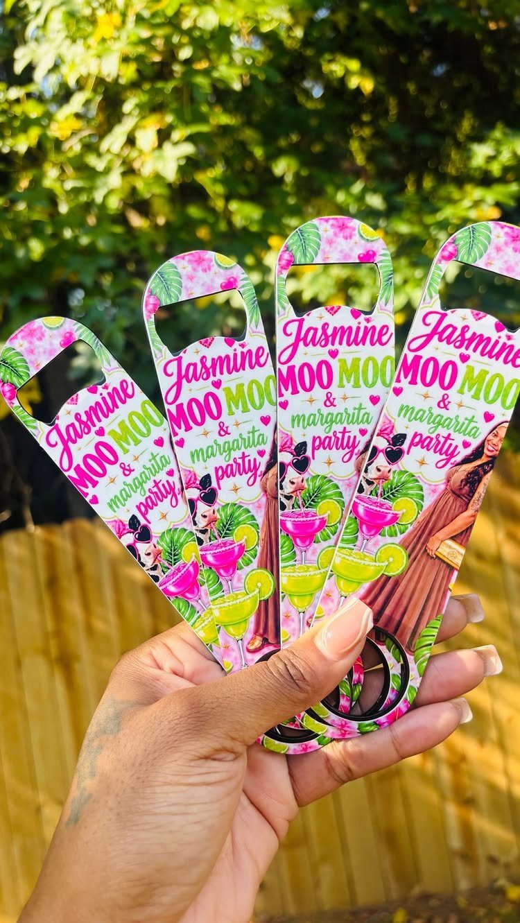 Custom printed metal bottle openers with margarita party graphics held in a hand.