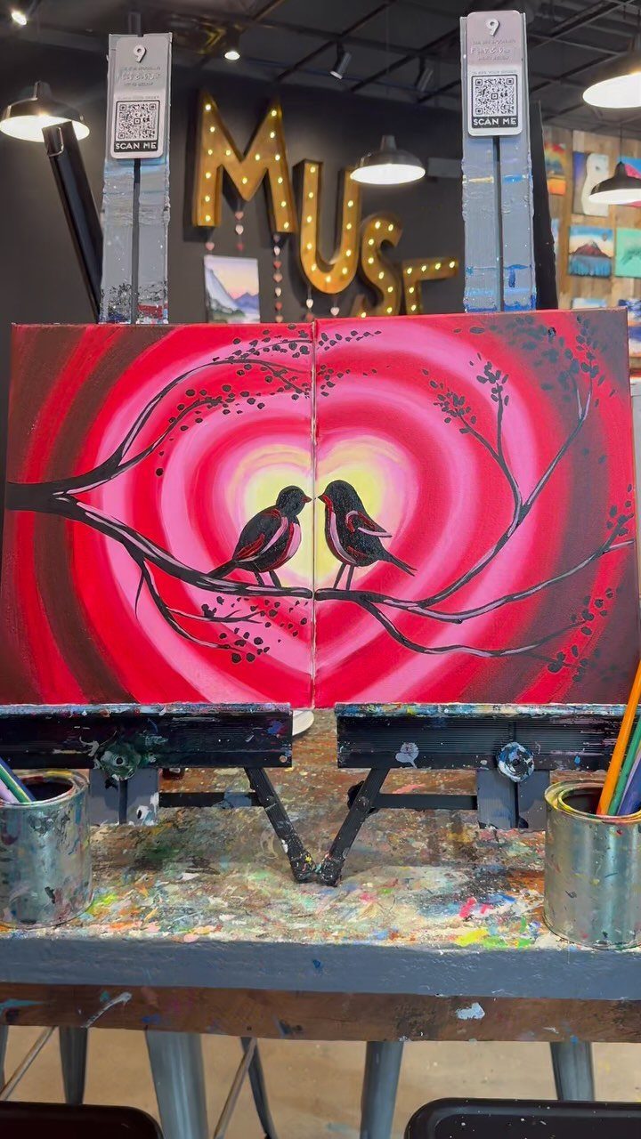Two canvases showing a painting of birds on a branch in red tones.