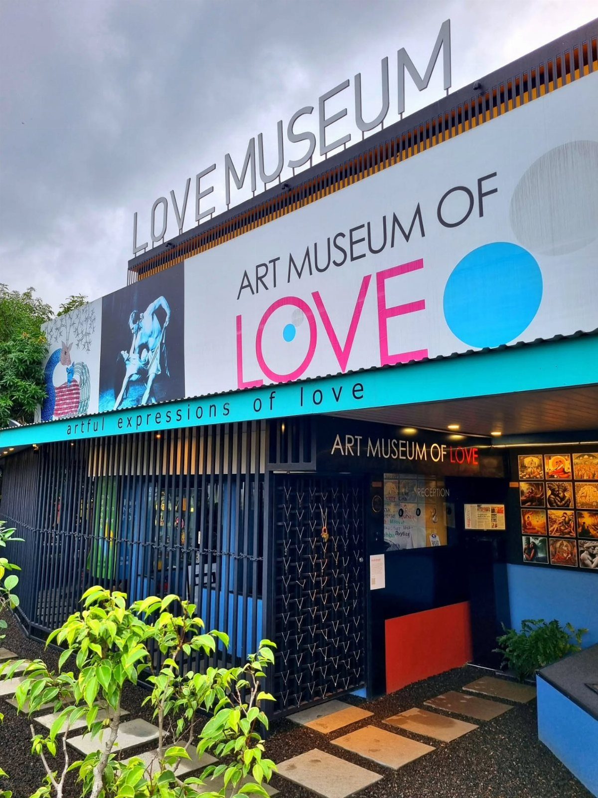 Art Museum of Love exterior with large signage and a blue awning entrance.